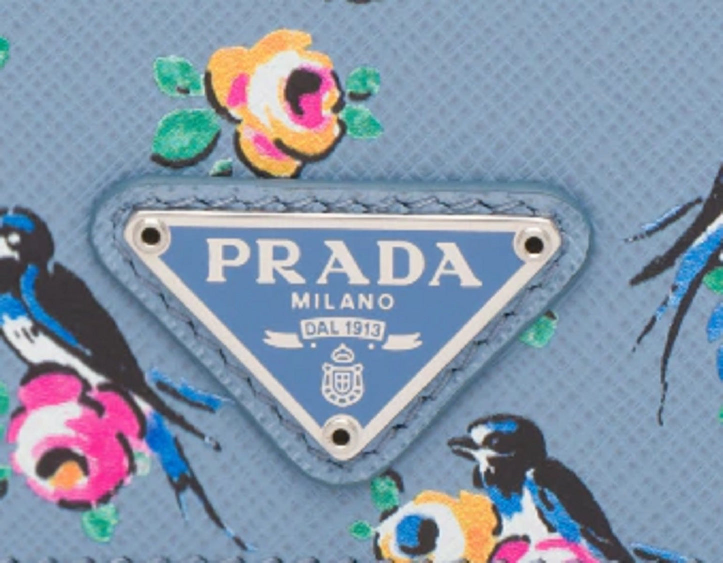 Prada Women's Astrale Blue Saffiano Leather Swallow Print Snap Bifold Wallet 1MV204