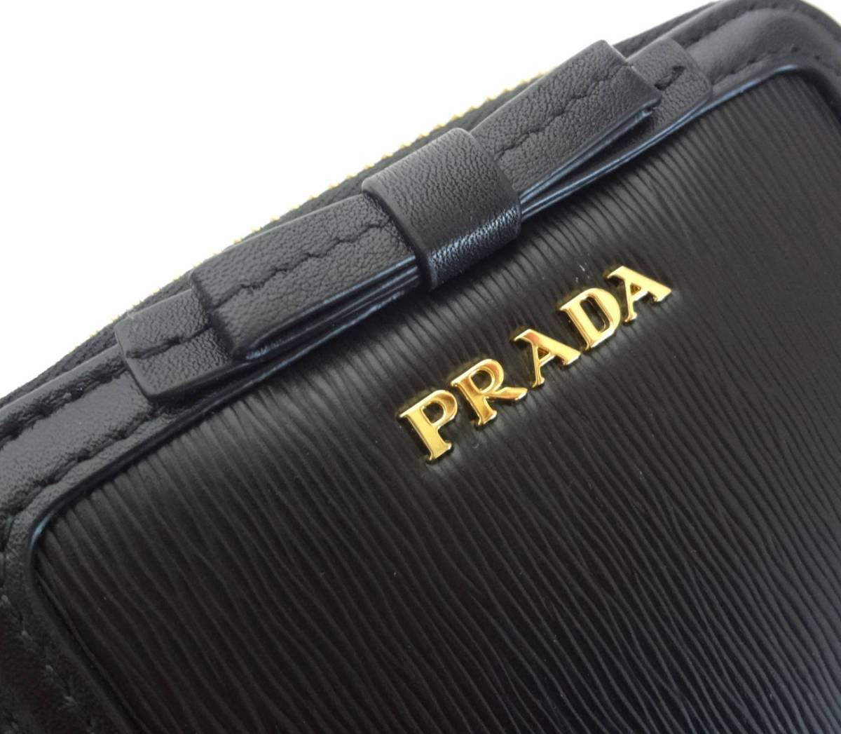 Prada Women's Black Nero Vitello Move Zip Flap Bow Wallet 1ML522