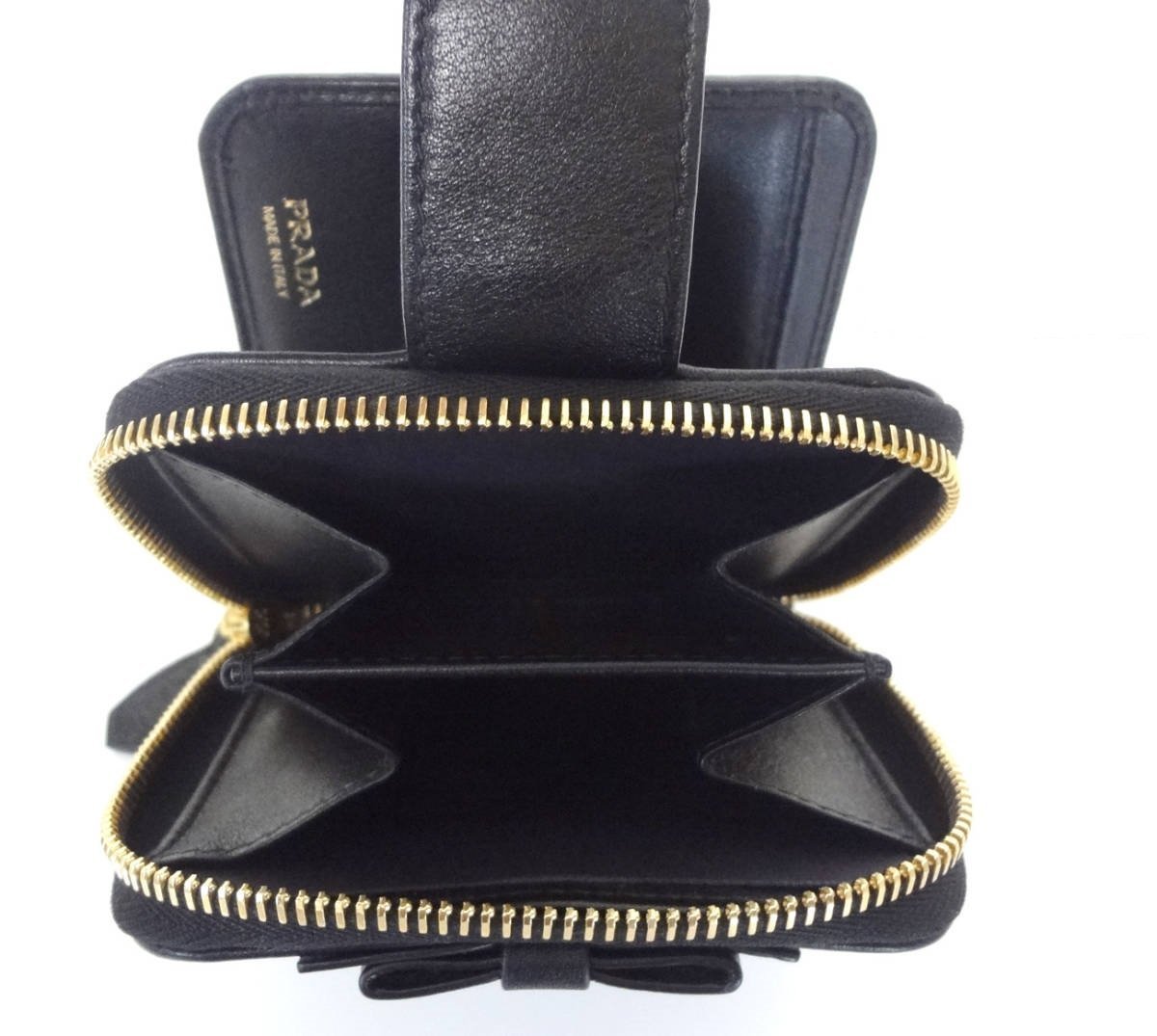 Prada Women's Black Nero Vitello Move Zip Flap Bow Wallet 1ML522
