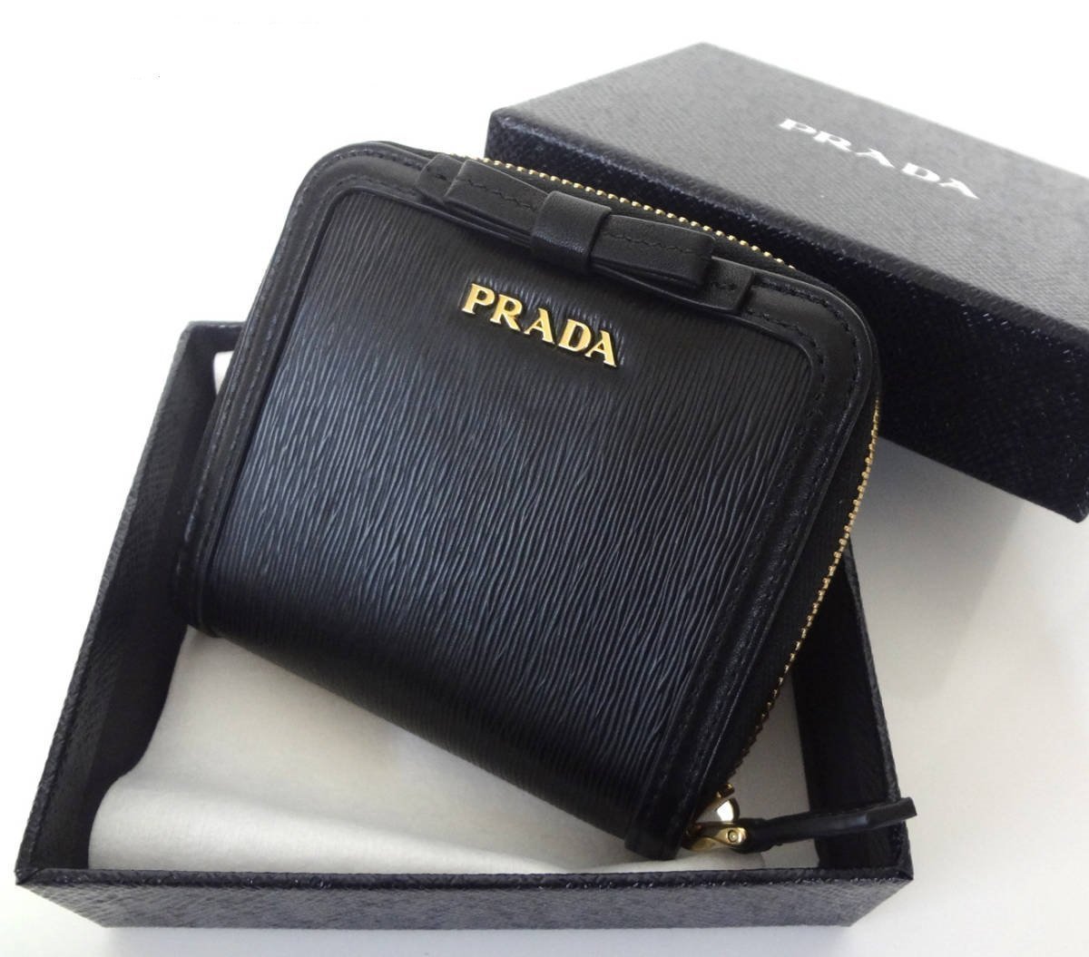 Prada Women's Black Nero Vitello Move Zip Flap Bow Wallet 1ML522