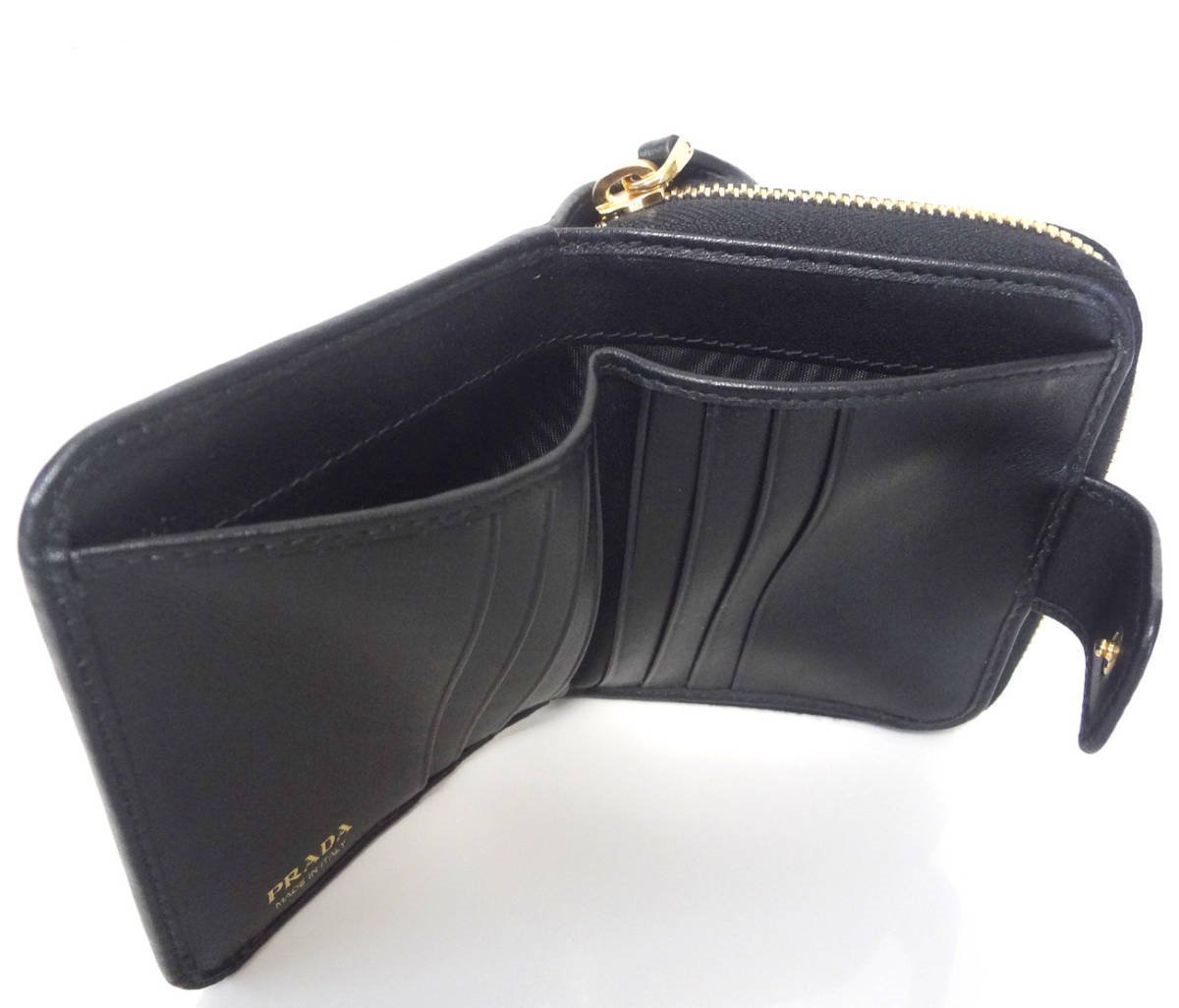 Prada Women's Black Nero Vitello Move Zip Flap Bow Wallet 1ML522