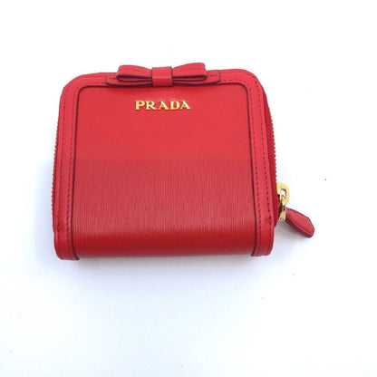 Prada Portafoglio Lampo Fuxia Light Red Vitello Move Zip Flap Bow Wallet 1ML522