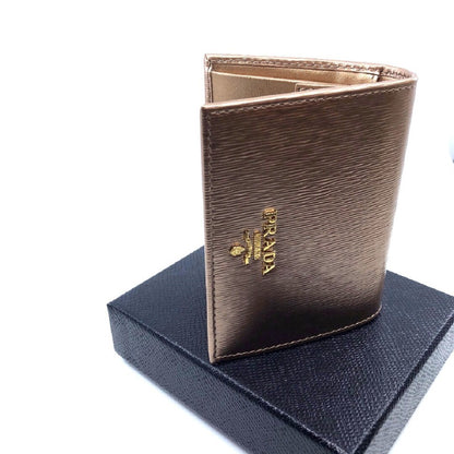 Prada Portafoglio Verticale Cipria Gold Mordore Vitello Move Flap Wallet 1MV204