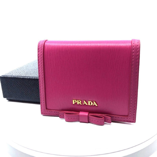 Prada Portafoglio Verticale Fuxia Pink Leather Flap Bow Wallet 1MV204