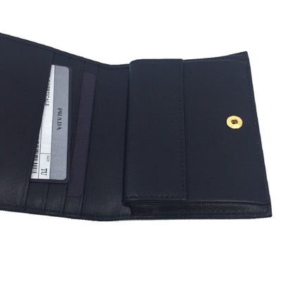 Prada Vitello Move Black Bifold Leather Flap Bow Snap Wallet 1MV204