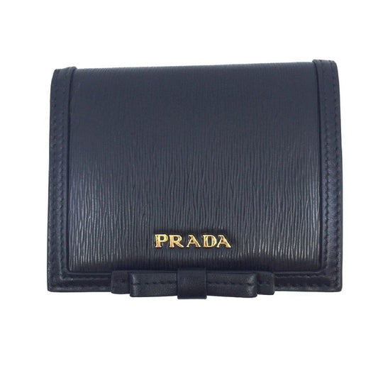 Prada Vitello Move Black Bifold Leather Flap Bow Snap Wallet 1MV204