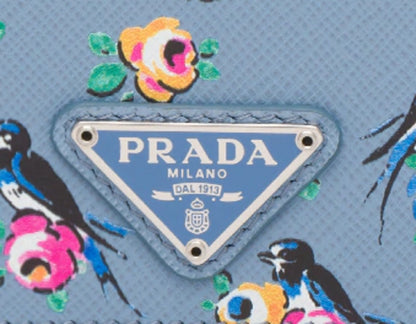Prada Women's Astrale Blue Saffiano Leather Swallow Print Snap Bifold Wallet 1MV204