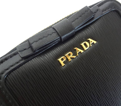 Prada Women's Black Nero Vitello Move Zip Flap Bow Wallet 1ML522