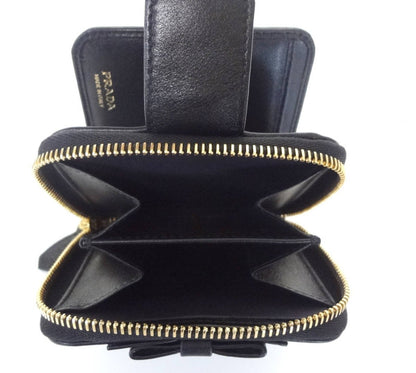 Prada Women's Black Nero Vitello Move Zip Flap Bow Wallet 1ML522