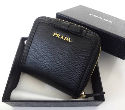 Prada Women's Black Nero Vitello Move Zip Flap Bow Wallet 1ML522