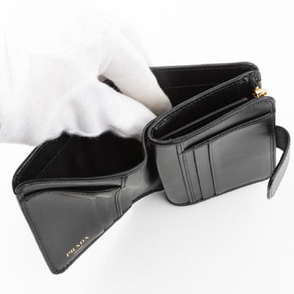 Prada Womens Saffiano Leather Nero Fuoco Black Snap Zip Wallet 1ML018
