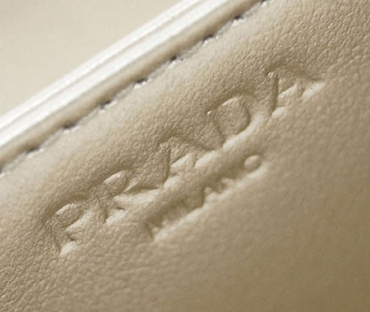 Prada Womens Vitello Move Pirite Gold Leather Zippered Wallet 1MM268