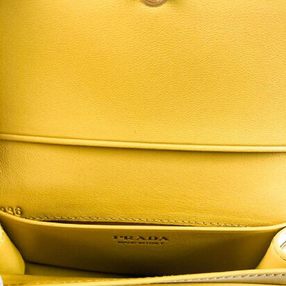 Prada Womens Vitello Move Sole Yellow Leather Card Case Wallet